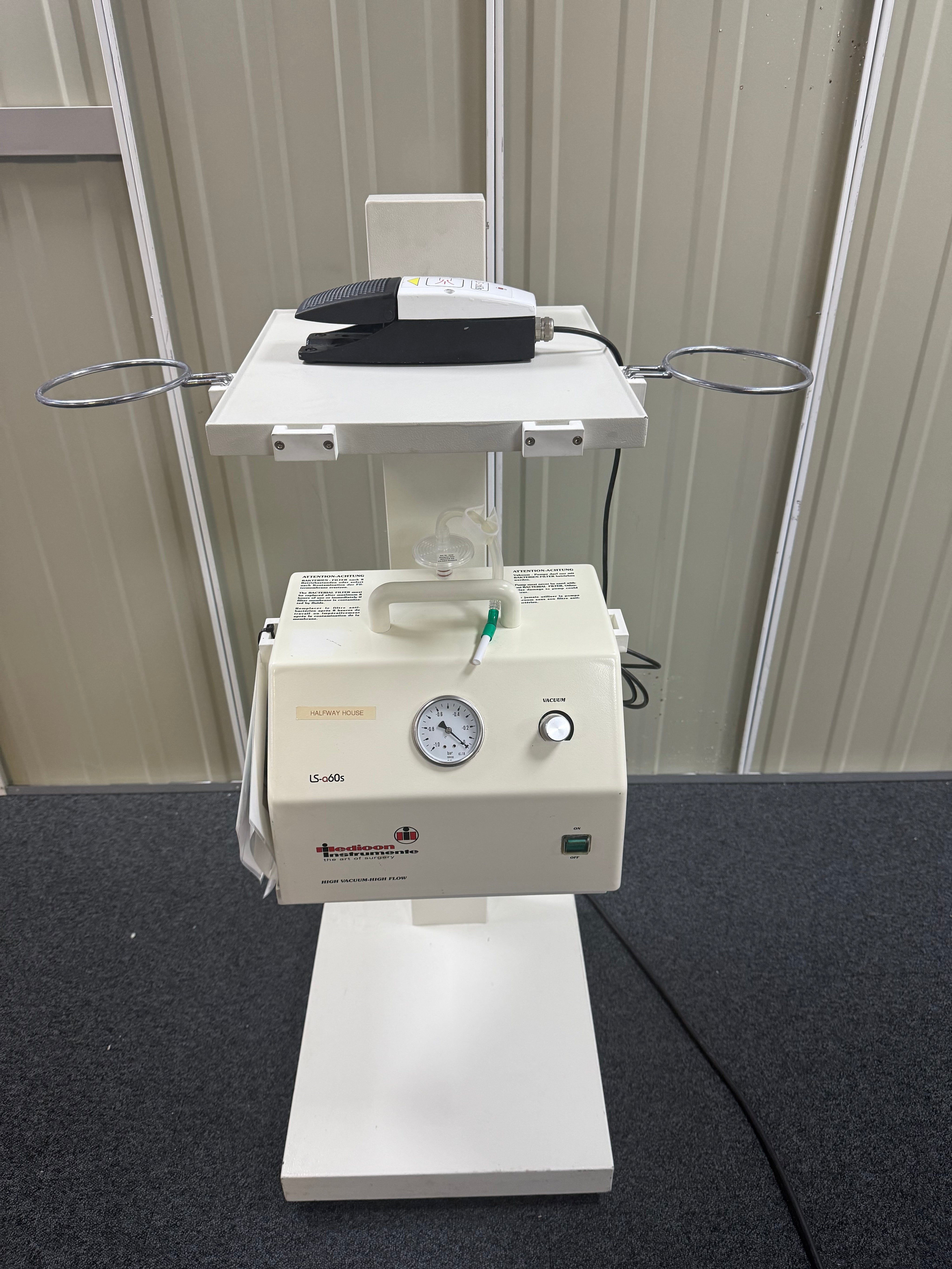 Medicon surgical suction device with ergonomic stand