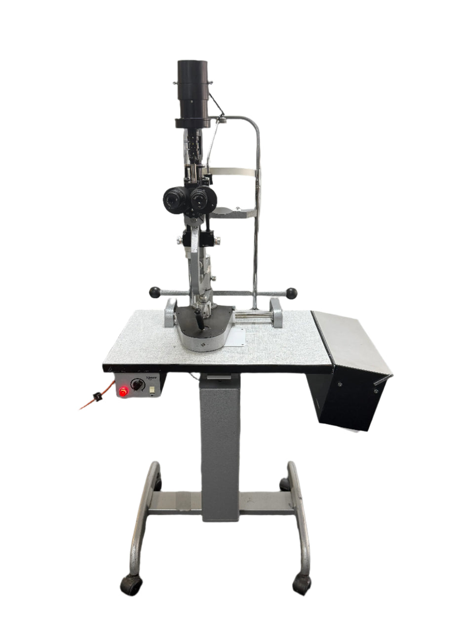 Mentor slit lamp biomicroscope mounted on manual table
