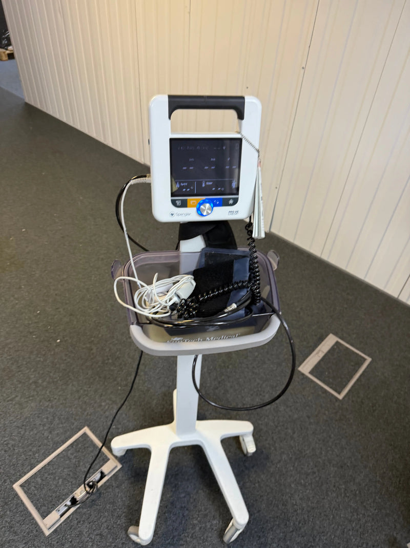 Mobile roll stand with BP cuff and SpO₂ sensor attached