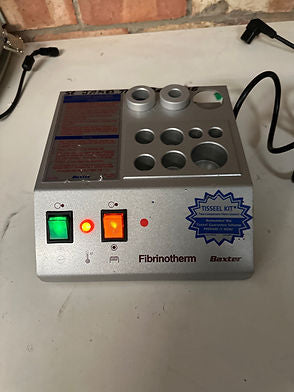 Overview of Fibrinotherm unit with vials in different heating wells