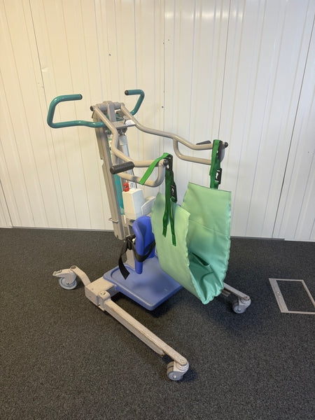 Patient sling suspended from Arjo Sara 3000 spreader bar