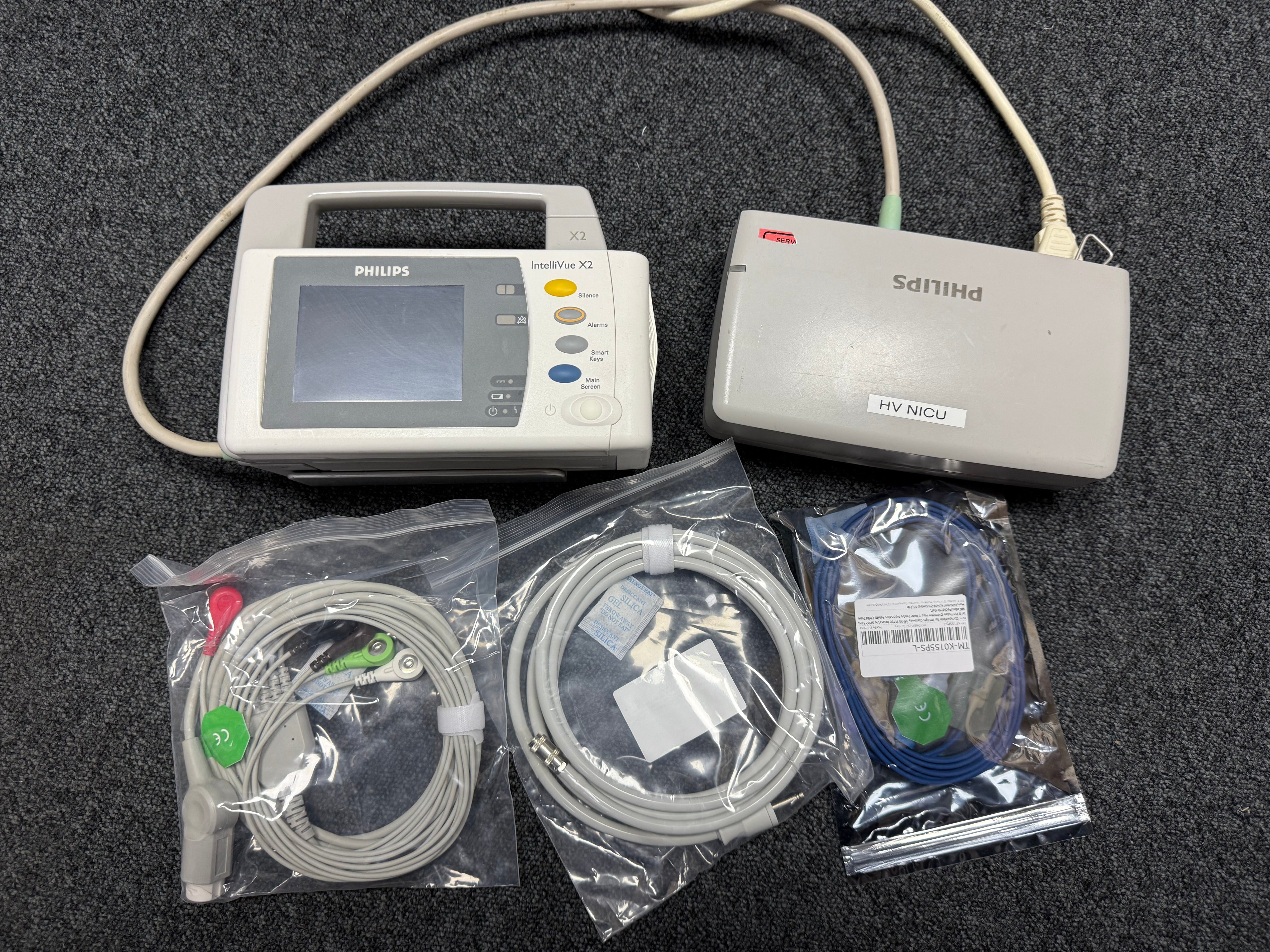 Philips IntelliVue X2 with NIBP cuff and sensor cables arranged