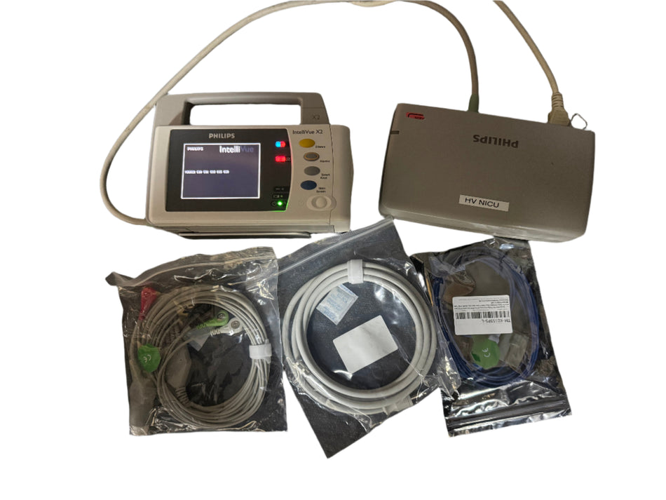 Philips X2 docked in monitoring station with cables attached
