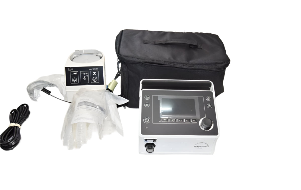 Prisma Vent 50 ventilator in a clinical setting with patient circuit.