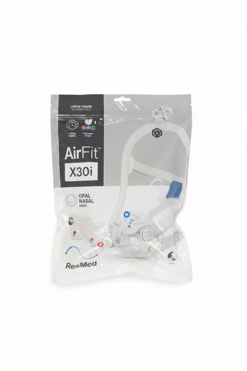 ResMed AirFit X30i oral nasal mask in its original retail packaging, placed on a dark gray textured carpet.