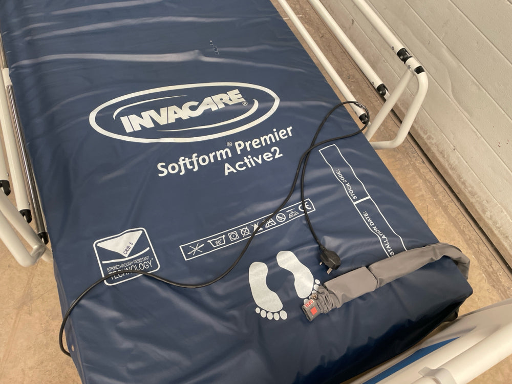 Richmond Ultra Low Electric Patient Bed with invacare mattress