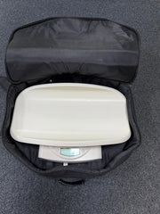 Seca 385 used as a flat scale for toddler weight measurement with bag
