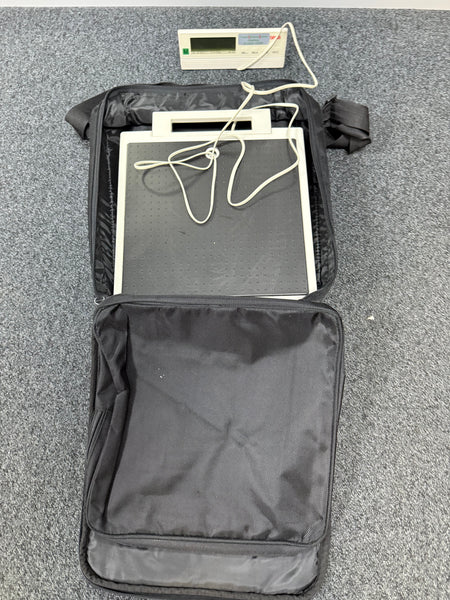 Seca 877 Class III Electronic Flat Scale with integrated foot pedal in a bag