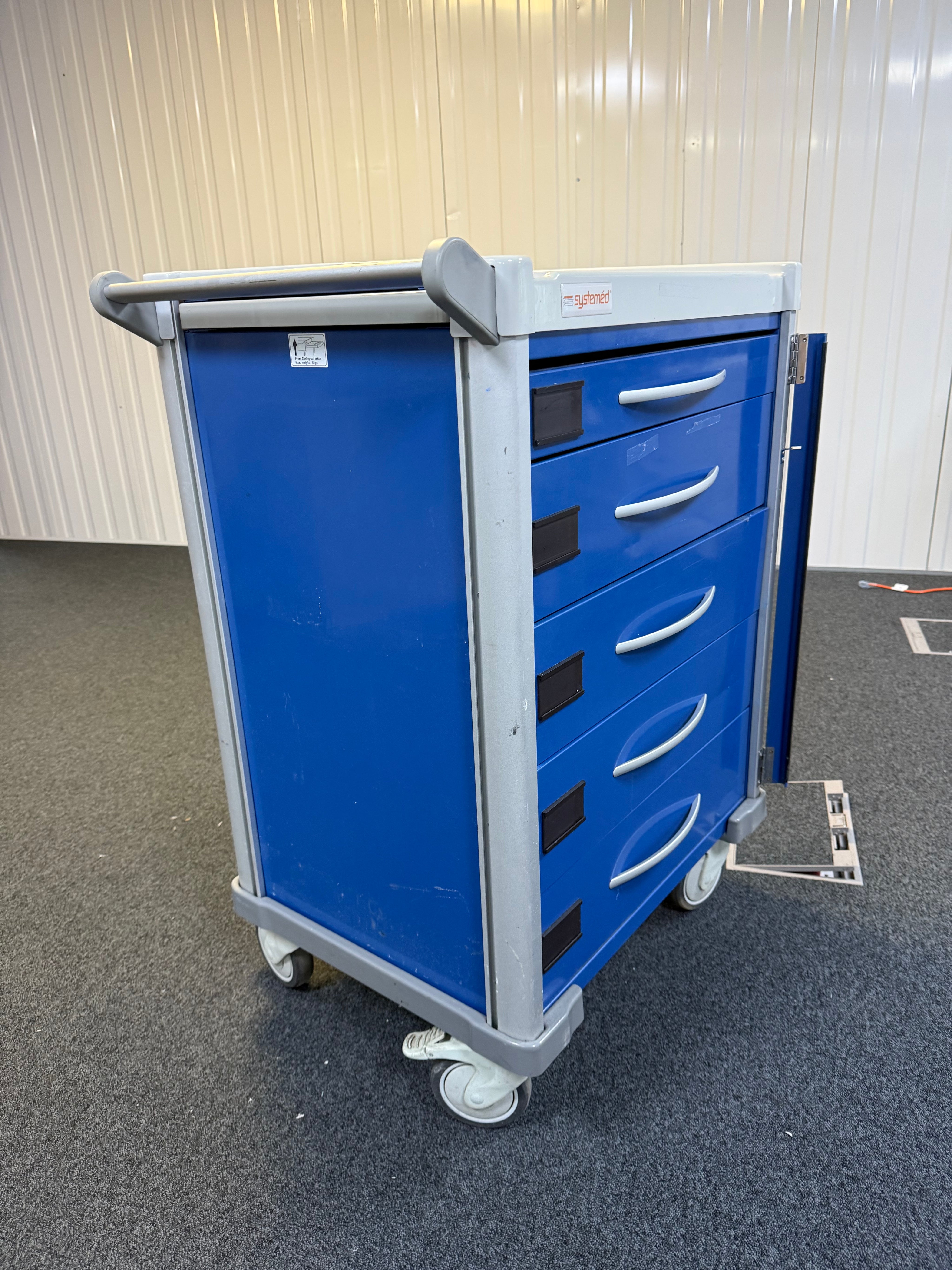 Side View of Mobile Systemed Crash Trolley with lockable casters for stability
