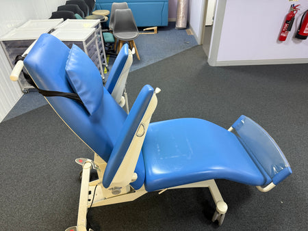 Side profile of BORCAD PURA medical chair in upright patient position