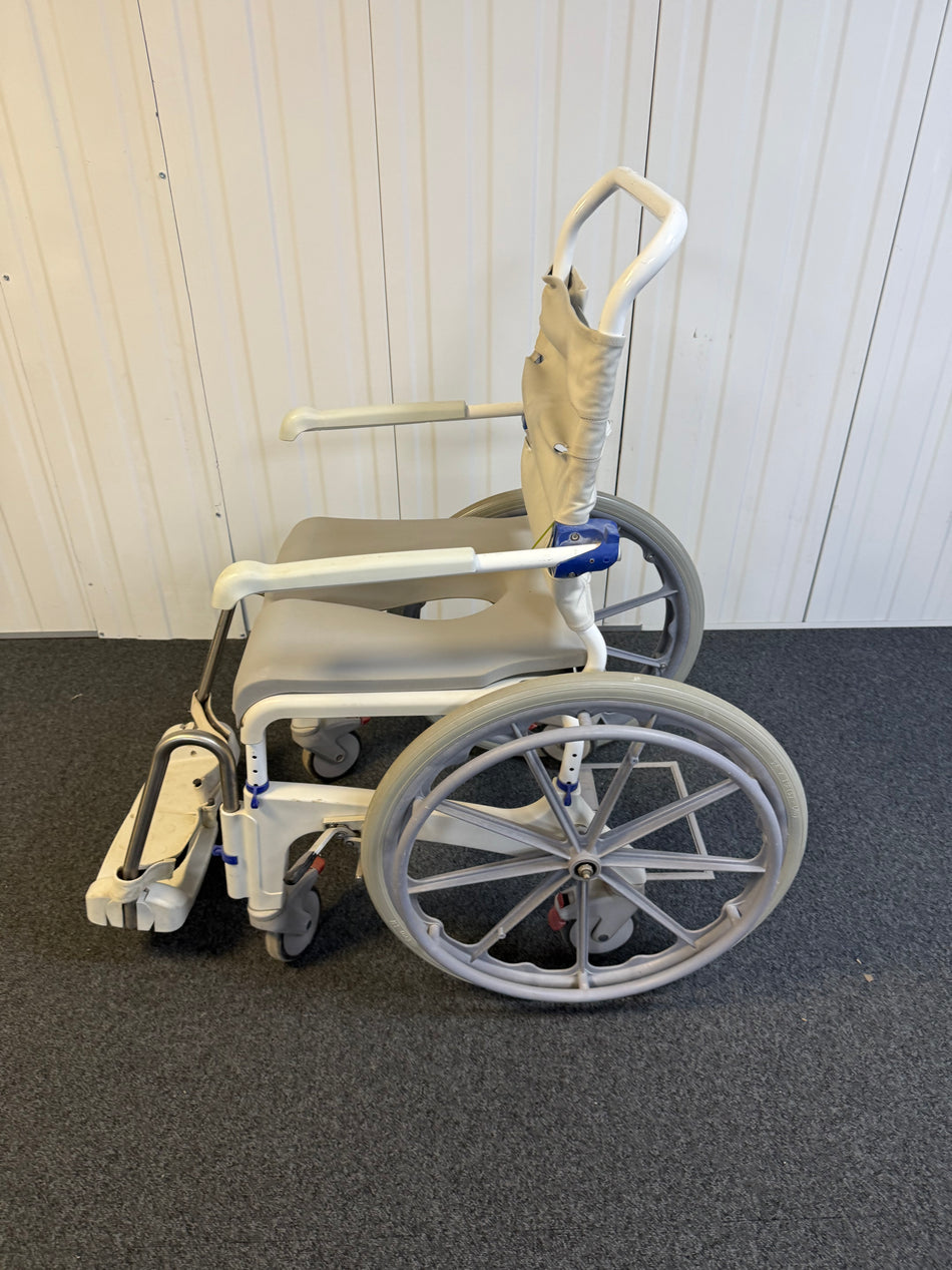 Side view of Aquatec Ocean Ergo XL shower chair with height-adjustable footrests