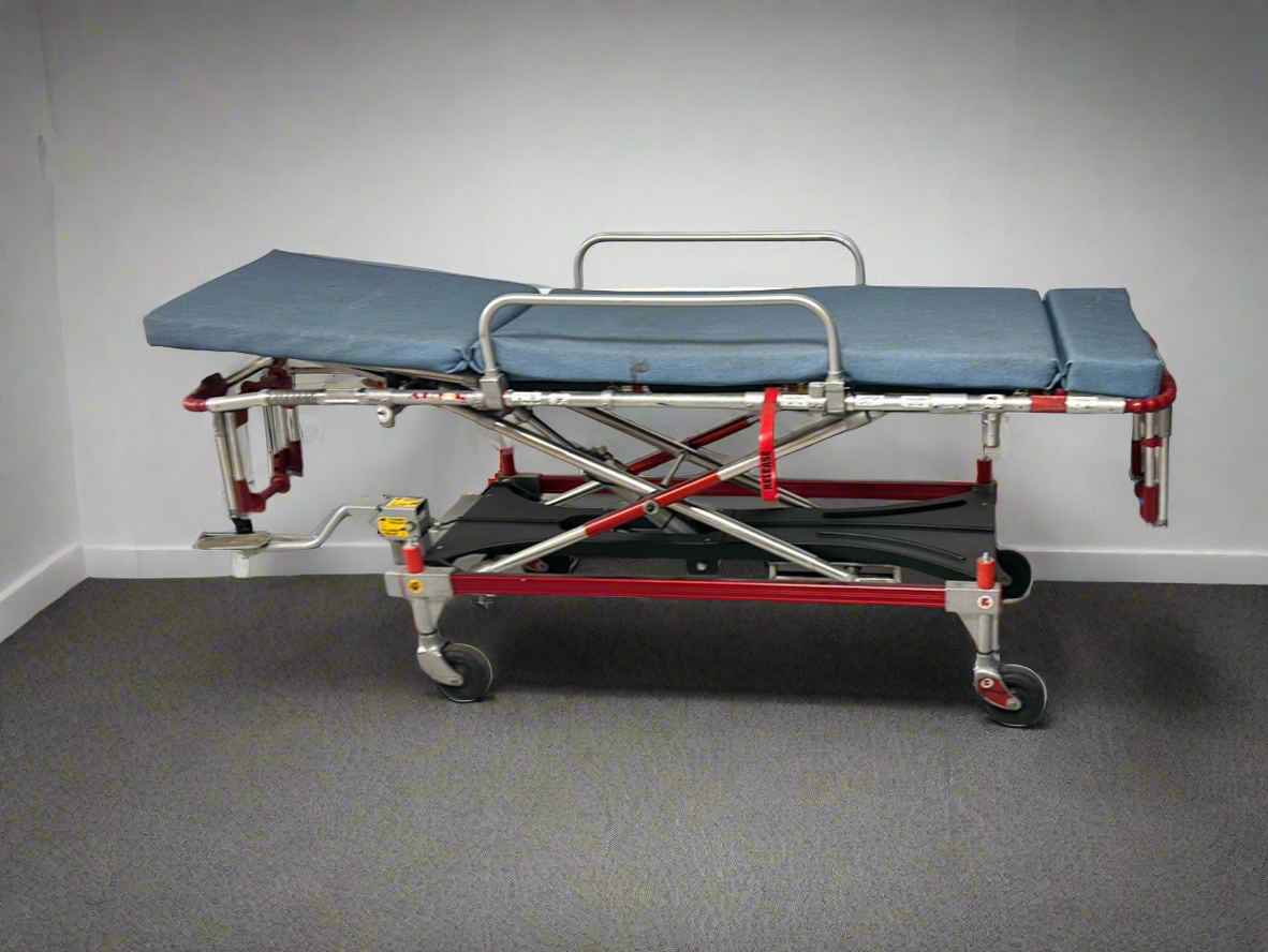 Side view of Falcon Six stretcher with safety straps