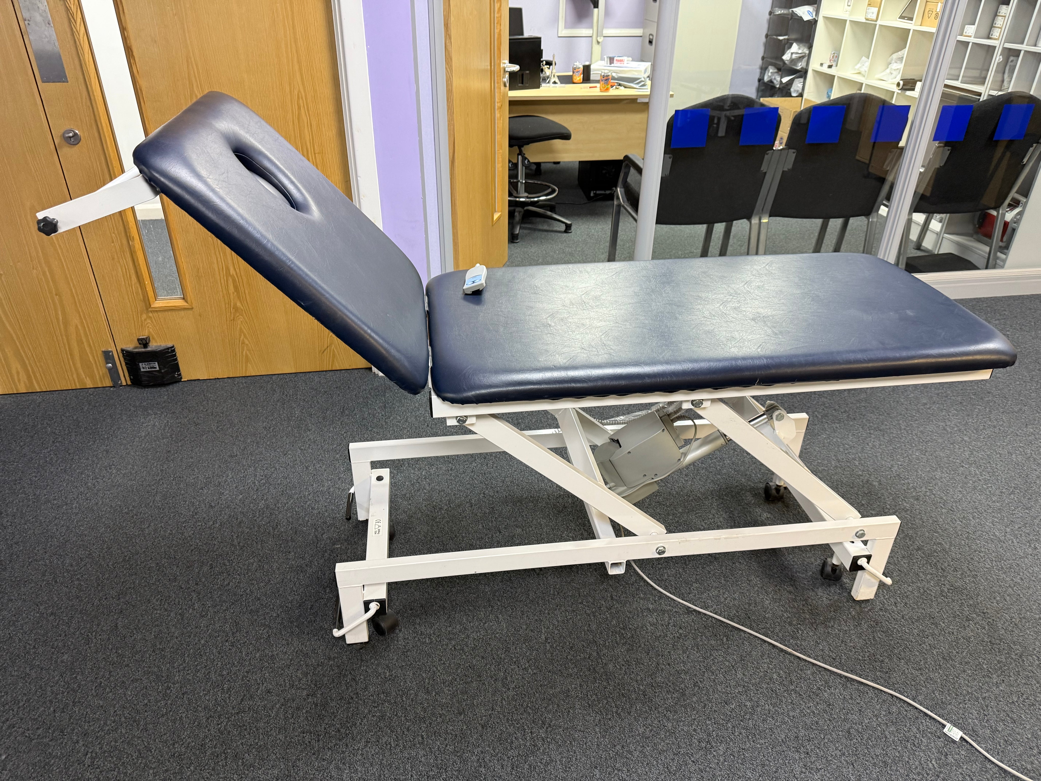 Side view of G Shaw examination couch showing manual backrest