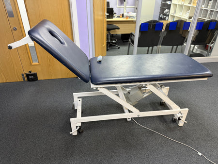 Side view of G Shaw examination couch showing manual backrest