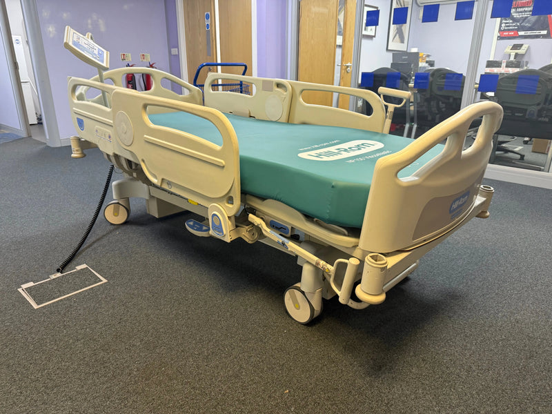 Side view of Hill-Rom electric bed with EasyChair mode activated