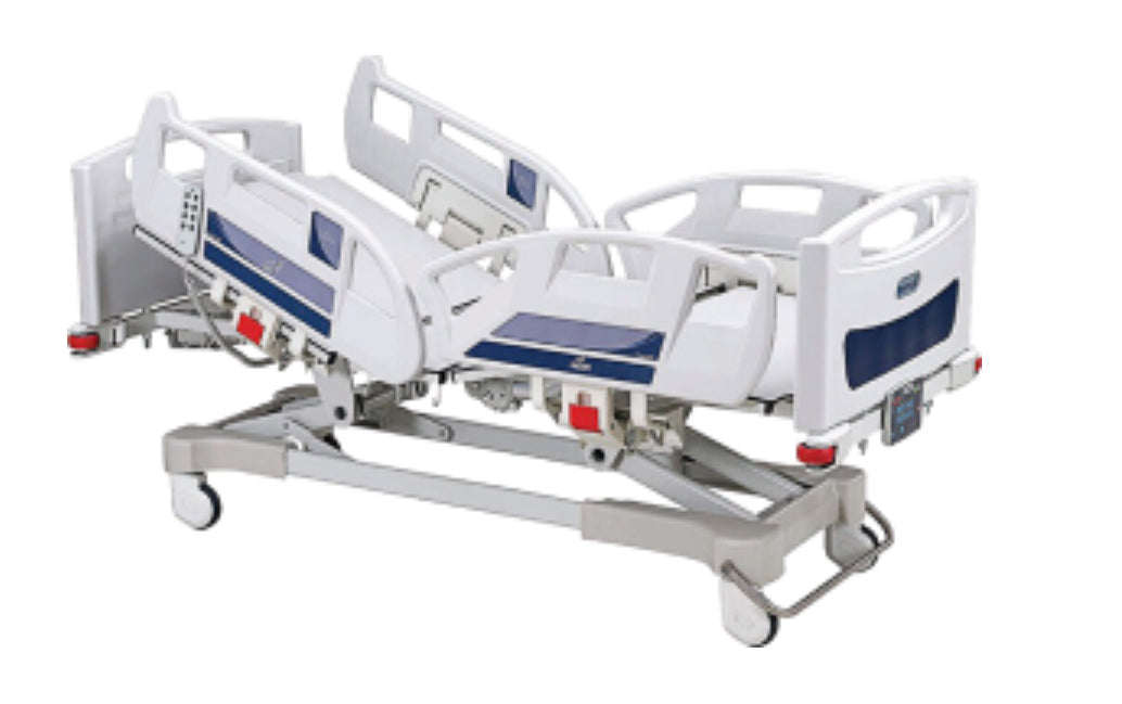 Side view of Kenmak Electric Patient Bed showing adjustable height