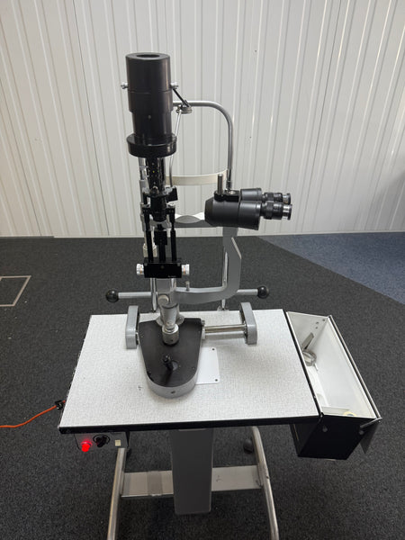 Side view of Mentor slit lamp on ophthalmic table