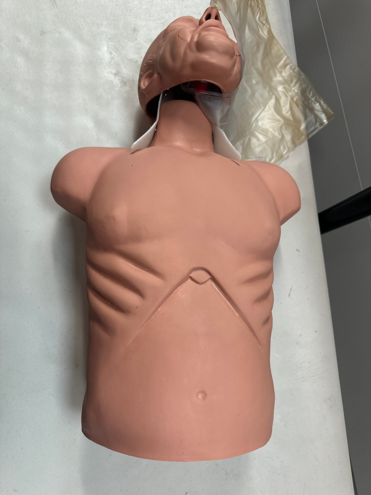 Realistic airway manipulation feature on the Simulaids Adult CPR Manikin.