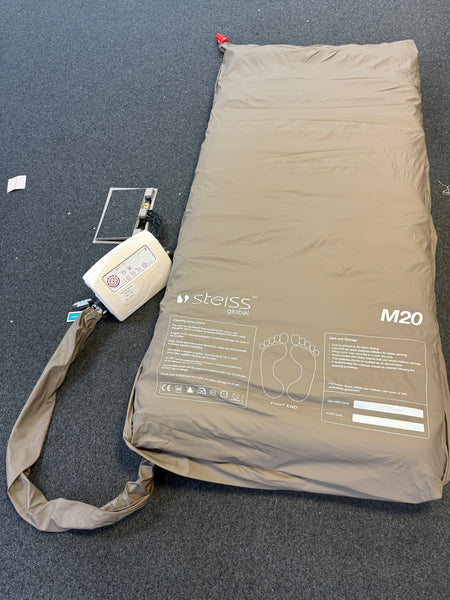 Steiss Global hospital mattress and pump front view