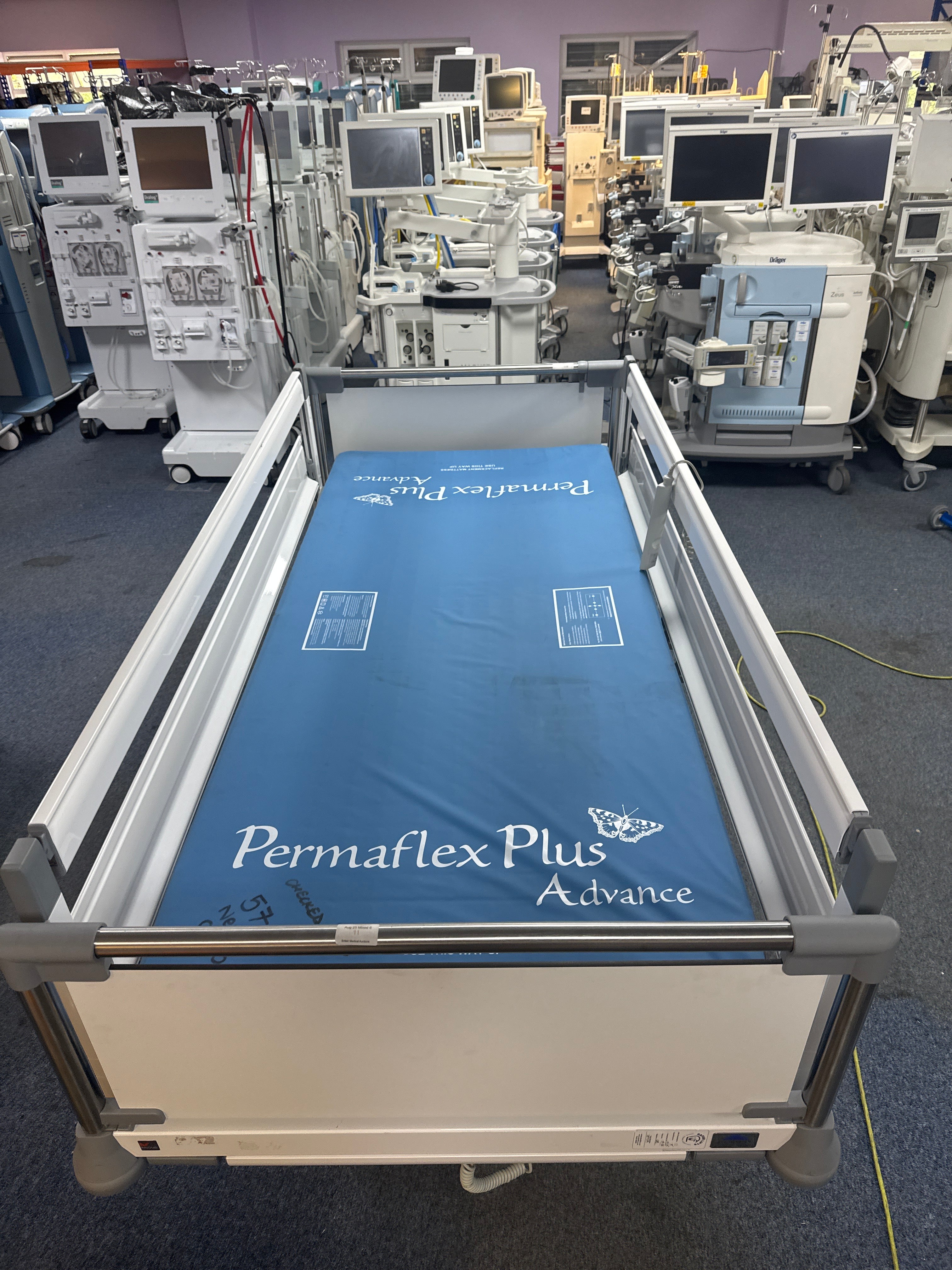 Stiegelmeyer Puro bed with optional safety side rails with mattress