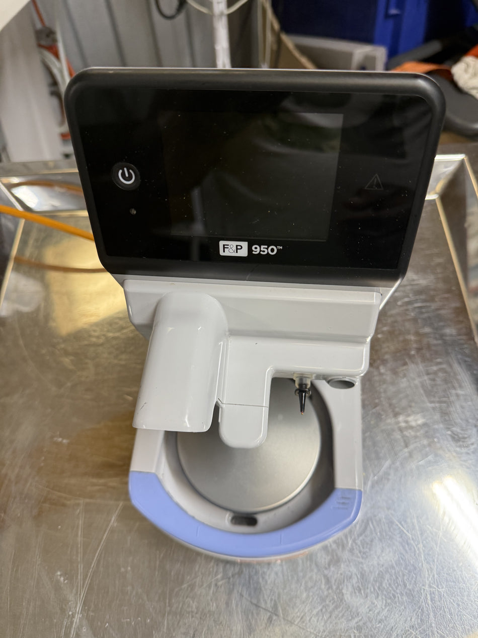 Close-up of the F&P 950 integrated touchscreen interface in clinical use