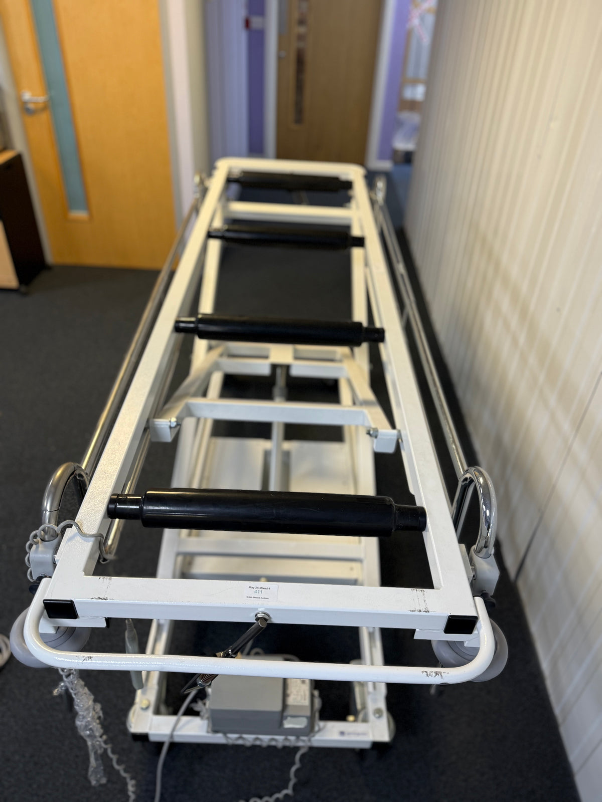 Top view of Electric mortuary table with stainless steel surface and height adjustment controls