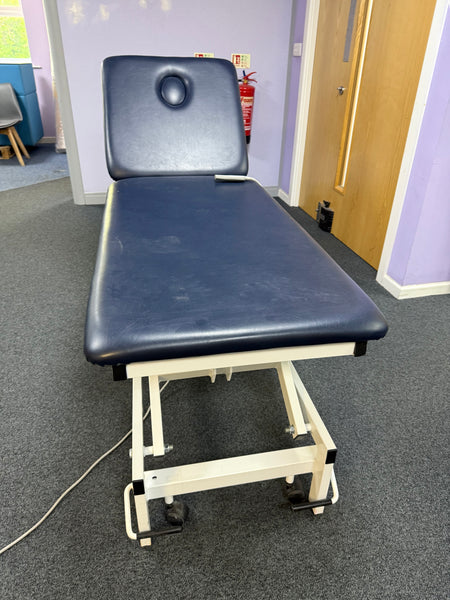 Top view of G Shaw electric examination couch with seamless upholstery