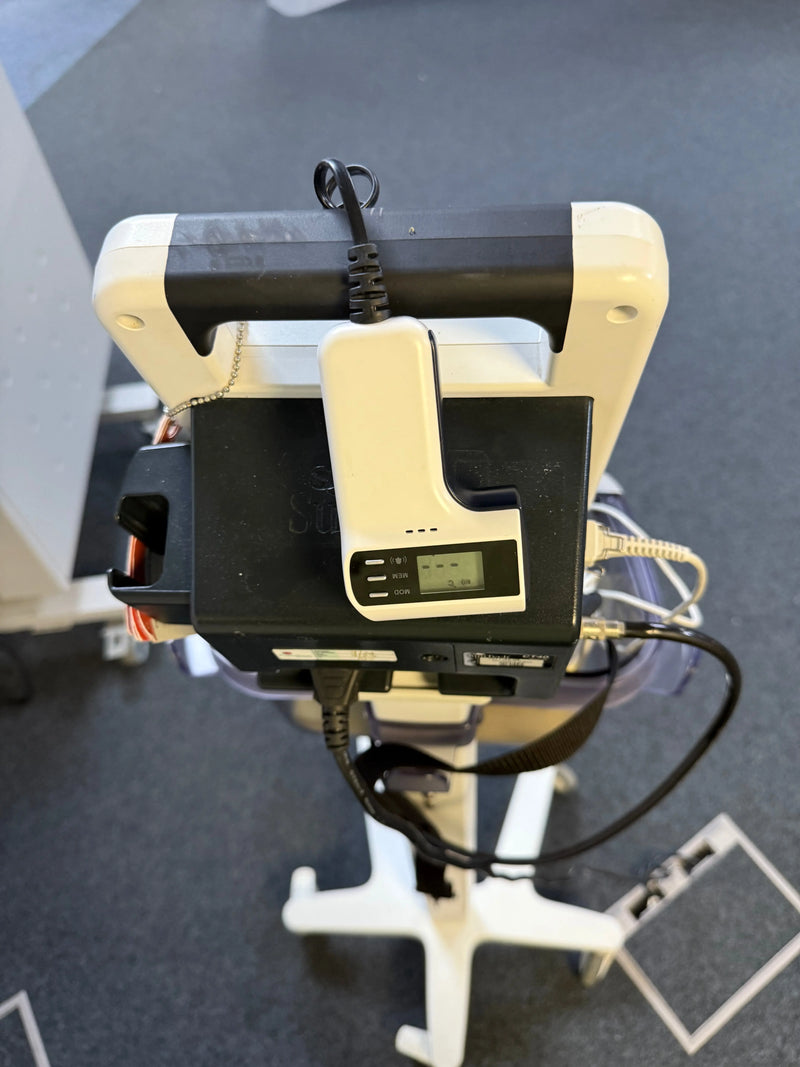 Top view of Suntech VS Check monitor with castor wheels