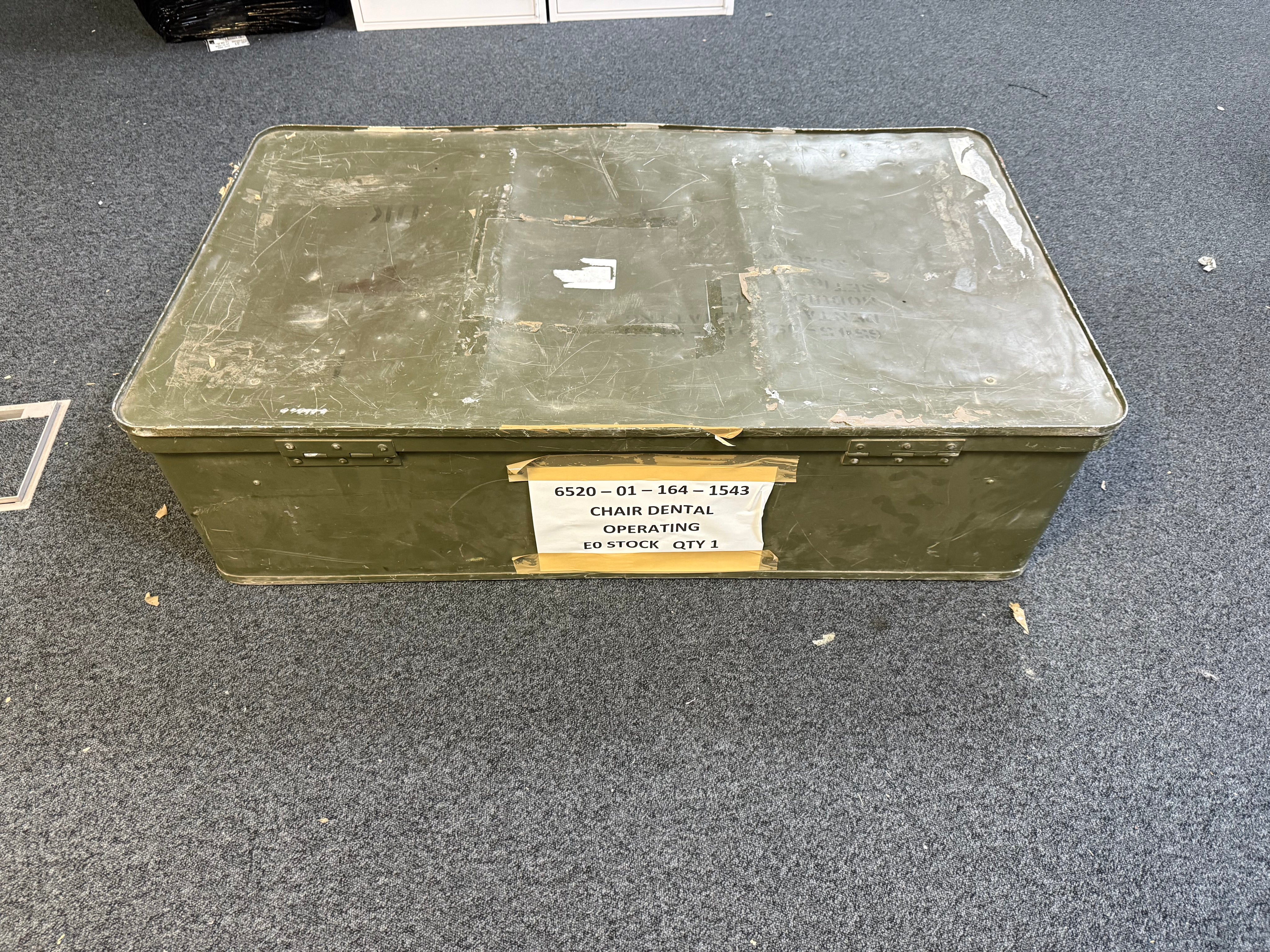 Folded A-Dec Porta-Chair in transport carry case