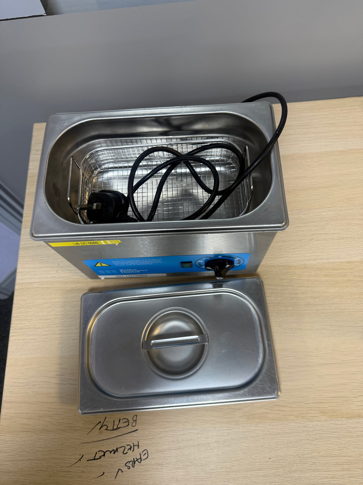 Walker Electronics QC Ultrasonic Cleaner in use, effectively cleaning dental instruments