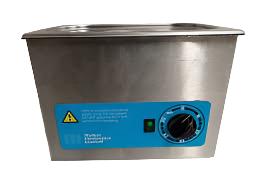 Walker Electronics QC Ultrasonic Cleaner in use, effectively cleaning dental instruments