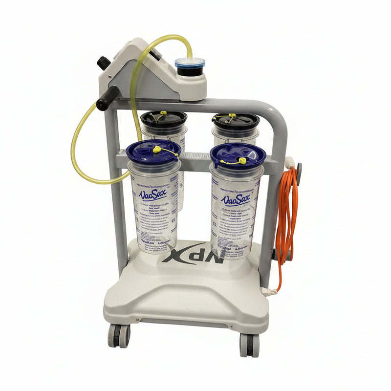A medical oxygen delivery cart with two clear canisters featuring blue caps, a yellow tubing connection, and an orange power cord, set against a white brick wall and gray floor.
