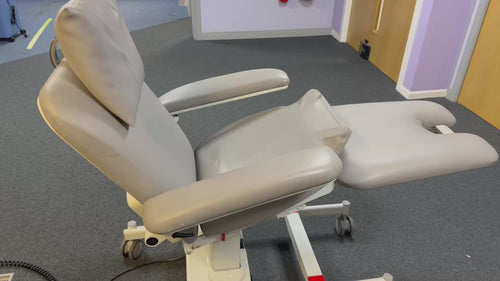 Medical staff adjusting the therapy chair settings