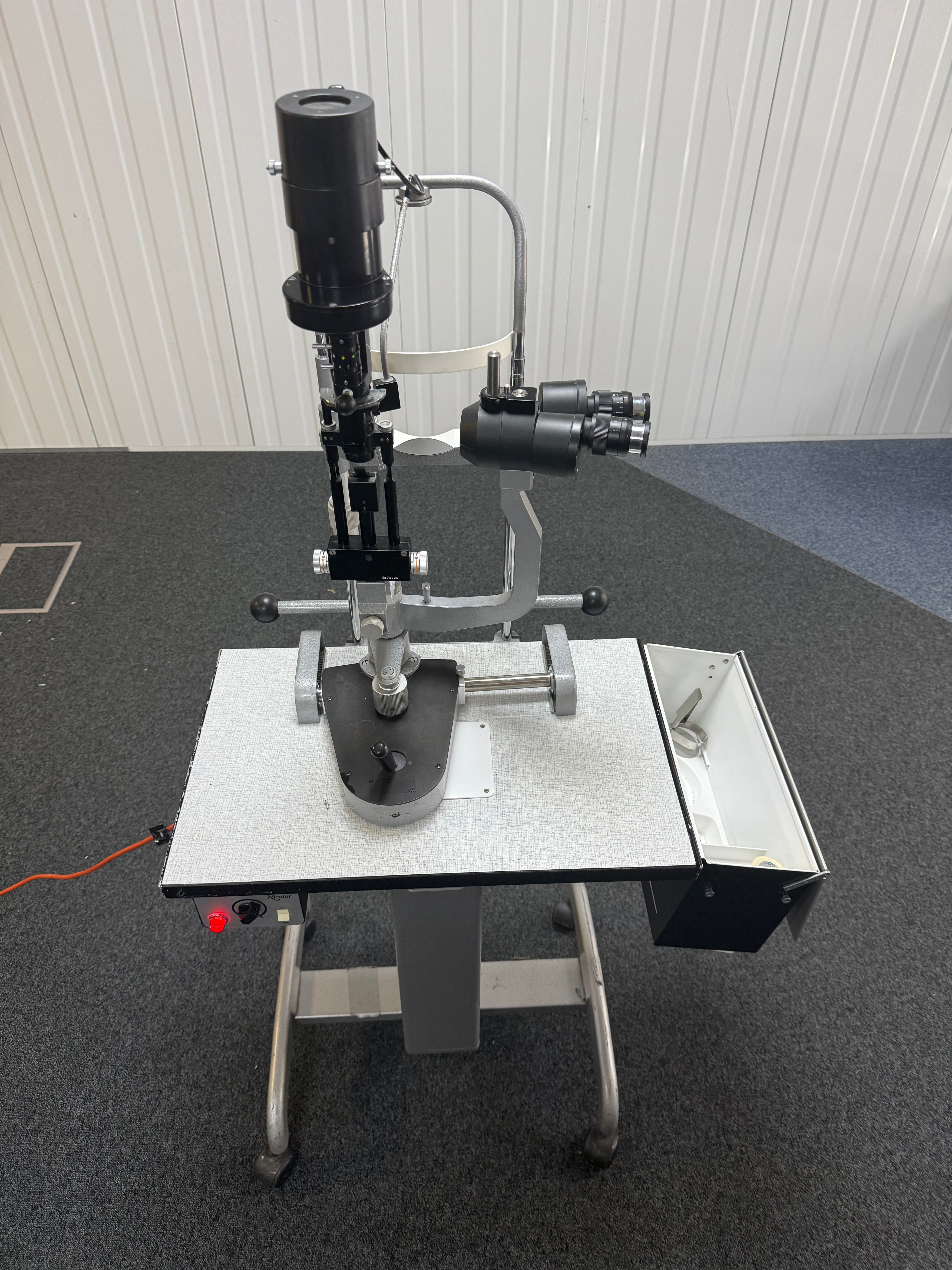side view of Mentor table-mounted slit lamp base