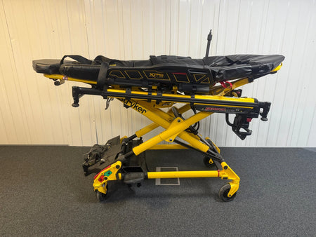 Used Stryker stretcher package including mattress, straps, battery, and charger